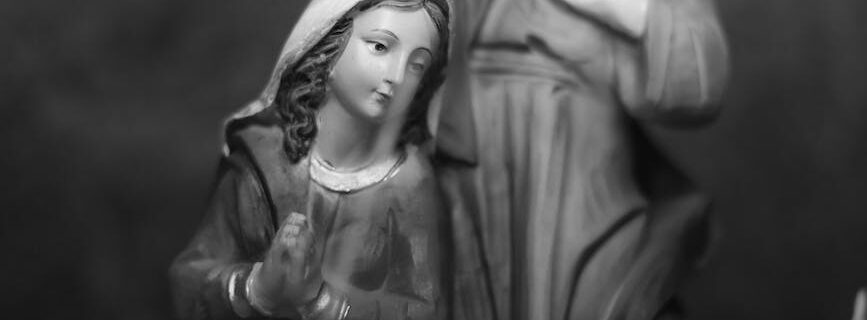 grayscale photo of a nativity figurines