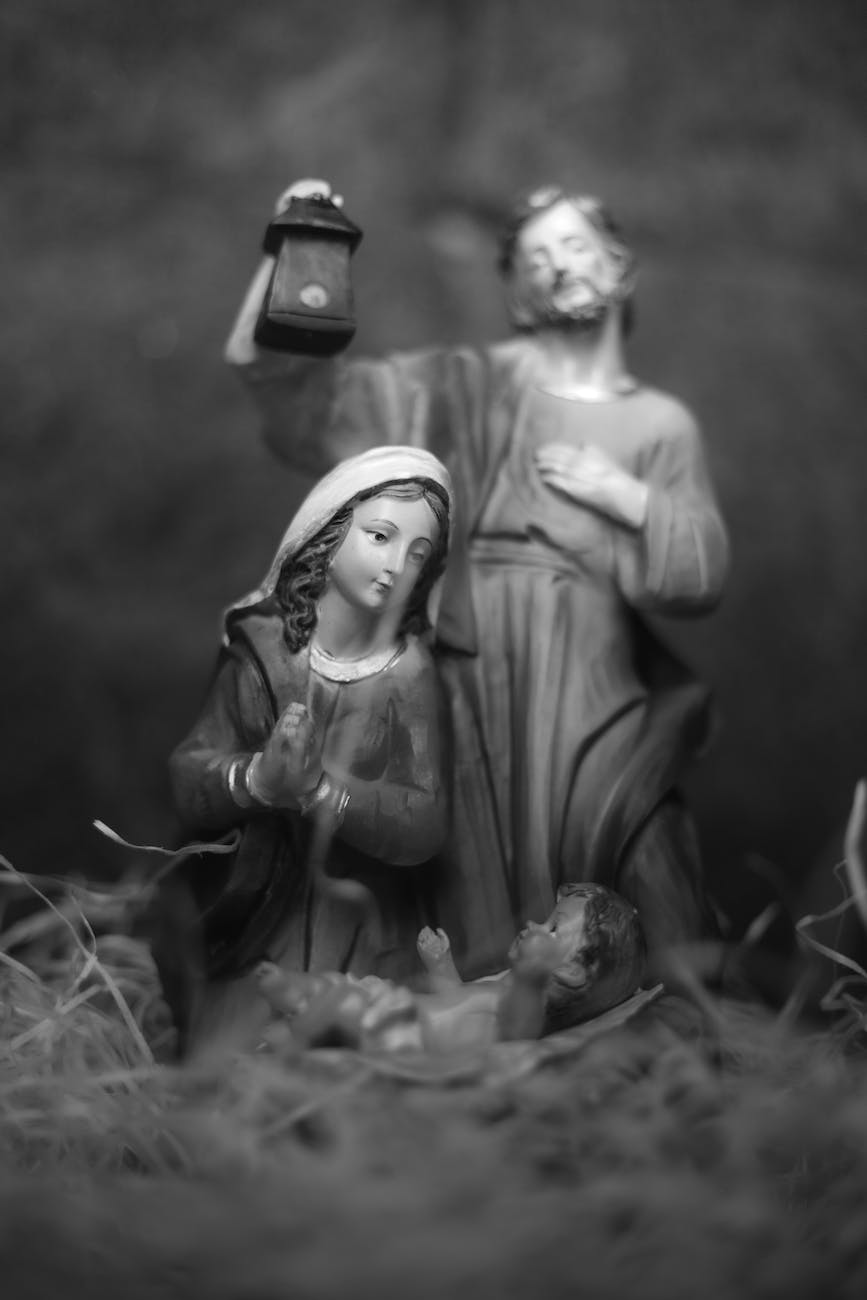 grayscale photo of a nativity figurines